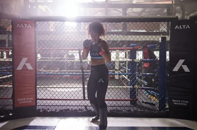 women in boxing ring training martial arts